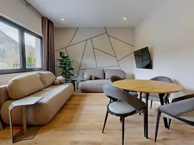 Ein Sitzbereich in der Unterkunft Stay Here Living Apartments