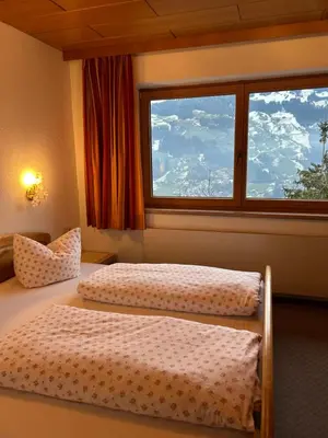 Ein Bett oder Betten in einem Zimmer der Unterkunft Ferienwohnung Schwendberg