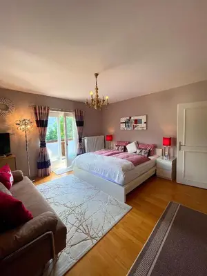 Ein Bett oder Betten in einem Zimmer der Unterkunft Edelweiss Chalet