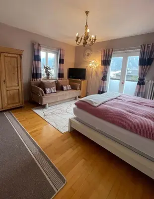 Ein Bett oder Betten in einem Zimmer der Unterkunft Edelweiss Chalet