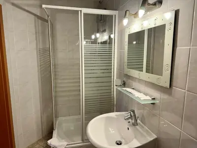 Ein Badezimmer in der Unterkunft Alpenlodge, Ferienwohnung 7