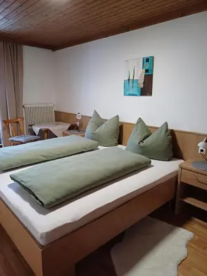 Ein Bett oder Betten in einem Zimmer der Unterkunft Frandlhof