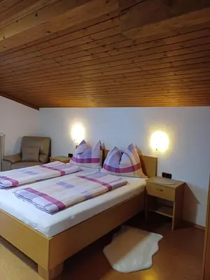 Ein Bett oder Betten in einem Zimmer der Unterkunft Frandlhof