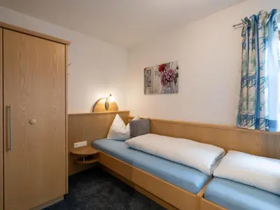 Ein Bett oder Betten in einem Zimmer der Unterkunft Apartment Daniela-5 by Interhome