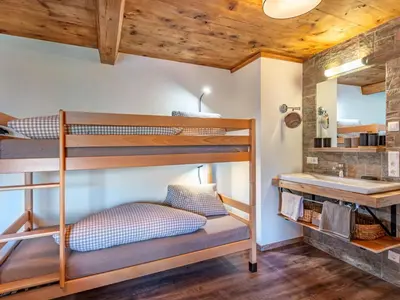 Ein Bett oder Betten in einem Zimmer der Unterkunft Apartment Obertal by Interhome