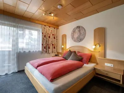 Ein Bett oder Betten in einem Zimmer der Unterkunft Apartment Daniela-2 by Interhome