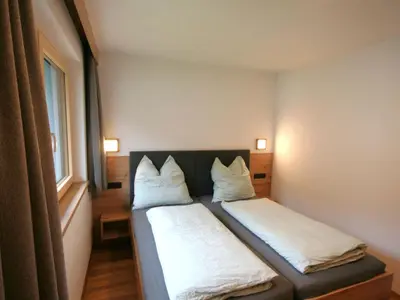 Ein Bett oder Betten in einem Zimmer der Unterkunft Apartment Kragenjoch by Interhome