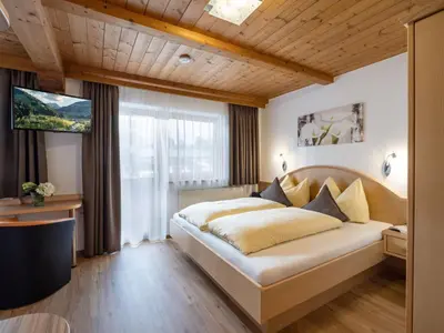 Ein Bett oder Betten in einem Zimmer der Unterkunft Apartment Daniela-3 by Interhome
