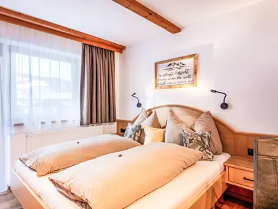 Ein Bett oder Betten in einem Zimmer der Unterkunft Apartment Daniela-3 by Interhome