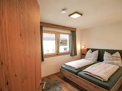 Ein Bett oder Betten in einem Zimmer der Unterkunft Apartment Rosskopf by Interhome