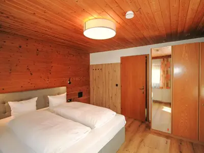Ein Bett oder Betten in einem Zimmer der Unterkunft Apartment Manuel by Interhome