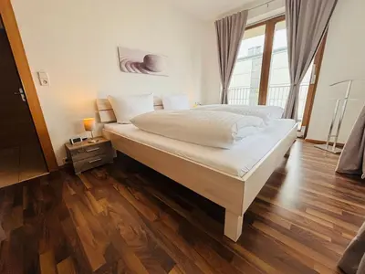Ein Bett oder Betten in einem Zimmer der Unterkunft Apart Spieljochbahn