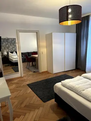 Ein Bett oder Betten in einem Zimmer der Unterkunft Wohnung im Herzen Kitzbühels