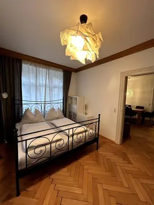 Ein Bett oder Betten in einem Zimmer der Unterkunft Wohnung im Herzen Kitzbühels