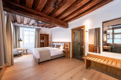 Ein Bett oder Betten in einem Zimmer der Unterkunft Hotel Traube Rattenberg