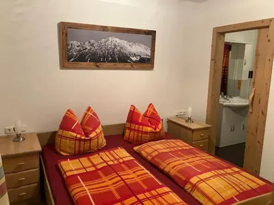 Ein Bett oder Betten in einem Zimmer der Unterkunft Ferienhaus Vordergrub