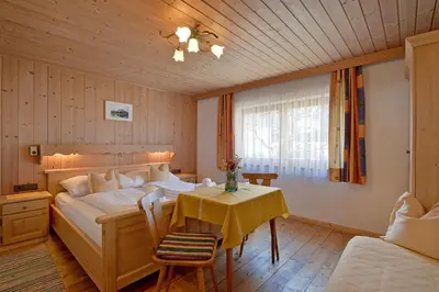 Ein Bett oder Betten in einem Zimmer der Unterkunft Ferienhaus Lindner by NV-Appartements