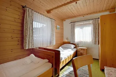 Ein Bett oder Betten in einem Zimmer der Unterkunft Ferienhaus Lindner by NV-Appartements