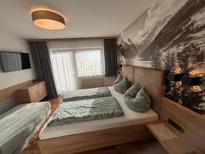 Ein Bett oder Betten in einem Zimmer der Unterkunft Appartmenthaus Martina