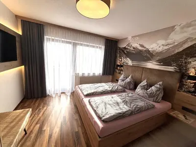 Ein Bett oder Betten in einem Zimmer der Unterkunft Appartmenthaus Martina