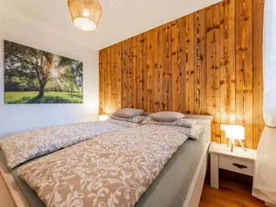 Ein Bett oder Betten in einem Zimmer der Unterkunft Tauernapart
