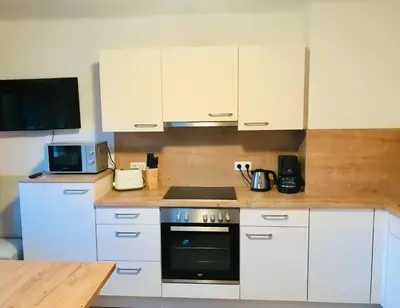 Küche/Küchenzeile in der Unterkunft Ferienwohnung Ingrid Hörbiger