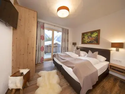 Ein Bett oder Betten in einem Zimmer der Unterkunft Chalet in Neukirchen near Ski Lift