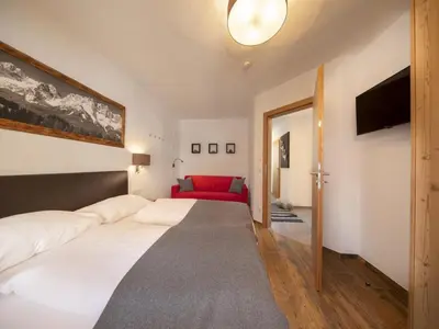Ein Bett oder Betten in einem Zimmer der Unterkunft Chalet in Neukirchen near Ski Lift