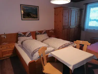 Ein Bett oder Betten in einem Zimmer der Unterkunft Ferienwohnung Jaglbauer inkl Joker Card im Sommer