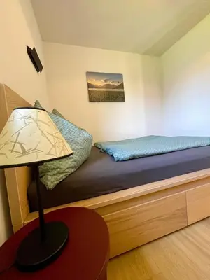 Ein Bett oder Betten in einem Zimmer der Unterkunft Ferienwohnung BergZeit Achensee