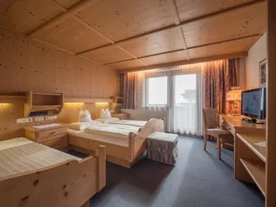Ein Bett oder Betten in einem Zimmer der Unterkunft Ferienwohnungen Egger