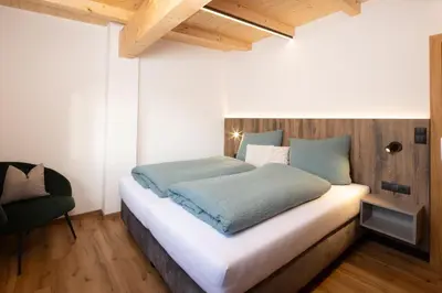 Ein Bett oder Betten in einem Zimmer der Unterkunft Apartment Rosenegg