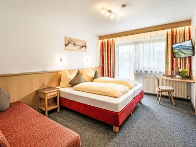 Ein Bett oder Betten in einem Zimmer der Unterkunft Apartment Daniela-6 by Interhome