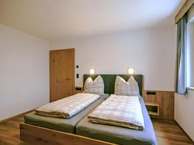 Ein Bett oder Betten in einem Zimmer der Unterkunft Apartment Hohe Salve by Interhome