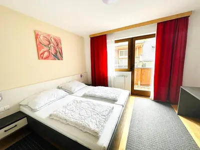 Ein Bett oder Betten in einem Zimmer der Unterkunft Apartment in Fügen near Ski Lift