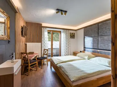 Ein Bett oder Betten in einem Zimmer der Unterkunft Ferienhaus Rauter