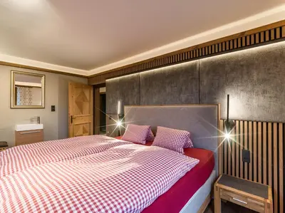 Ein Bett oder Betten in einem Zimmer der Unterkunft Ferienhaus Rauter