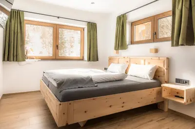 Ein Bett oder Betten in einem Zimmer der Unterkunft Ferienwohnungen Fiechtl