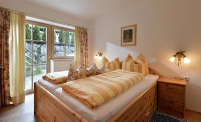 Ein Bett oder Betten in einem Zimmer der Unterkunft Haus Falkenberg