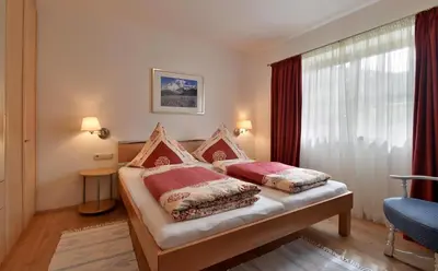 Ein Bett oder Betten in einem Zimmer der Unterkunft Haus Falkenberg