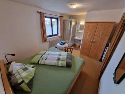 Ein Bett oder Betten in einem Zimmer der Unterkunft Ferienwohnung Farbmacher