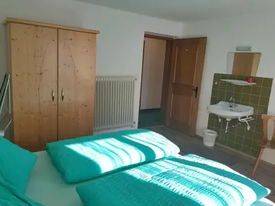 Ein Bett oder Betten in einem Zimmer der Unterkunft Ferienwohnung Farbmacher