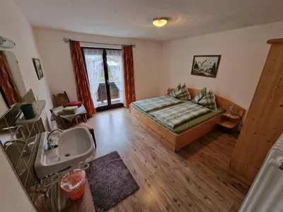 Ein Bett oder Betten in einem Zimmer der Unterkunft Ferienwohnung Farbmacher