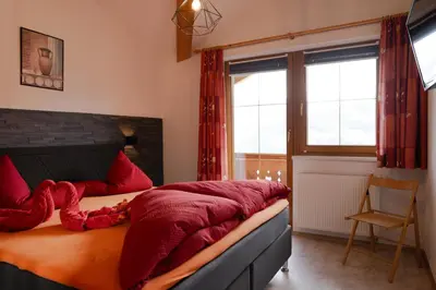 Ein Bett oder Betten in einem Zimmer der Unterkunft Zimmer by Appartement Sporer in Hippach