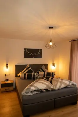 Ein Bett oder Betten in einem Zimmer der Unterkunft Zimmer by Appartement Sporer in Hippach