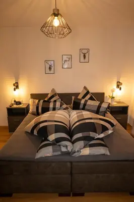 Ein Bett oder Betten in einem Zimmer der Unterkunft Zimmer by Appartement Sporer in Hippach