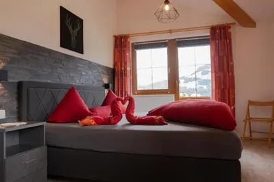 Ein Bett oder Betten in einem Zimmer der Unterkunft Zimmer by Appartement Sporer in Hippach