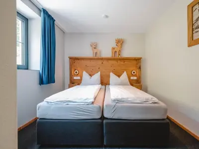 Ein Bett oder Betten in einem Zimmer der Unterkunft Apartment Fassl 2 by Interhome