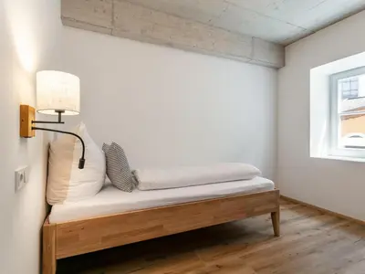 Ein Bett oder Betten in einem Zimmer der Unterkunft Hopfgarten Alpin Living Top 1 und 2