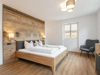 Ein Bett oder Betten in einem Zimmer der Unterkunft Hopfgarten Alpin Living Top 3